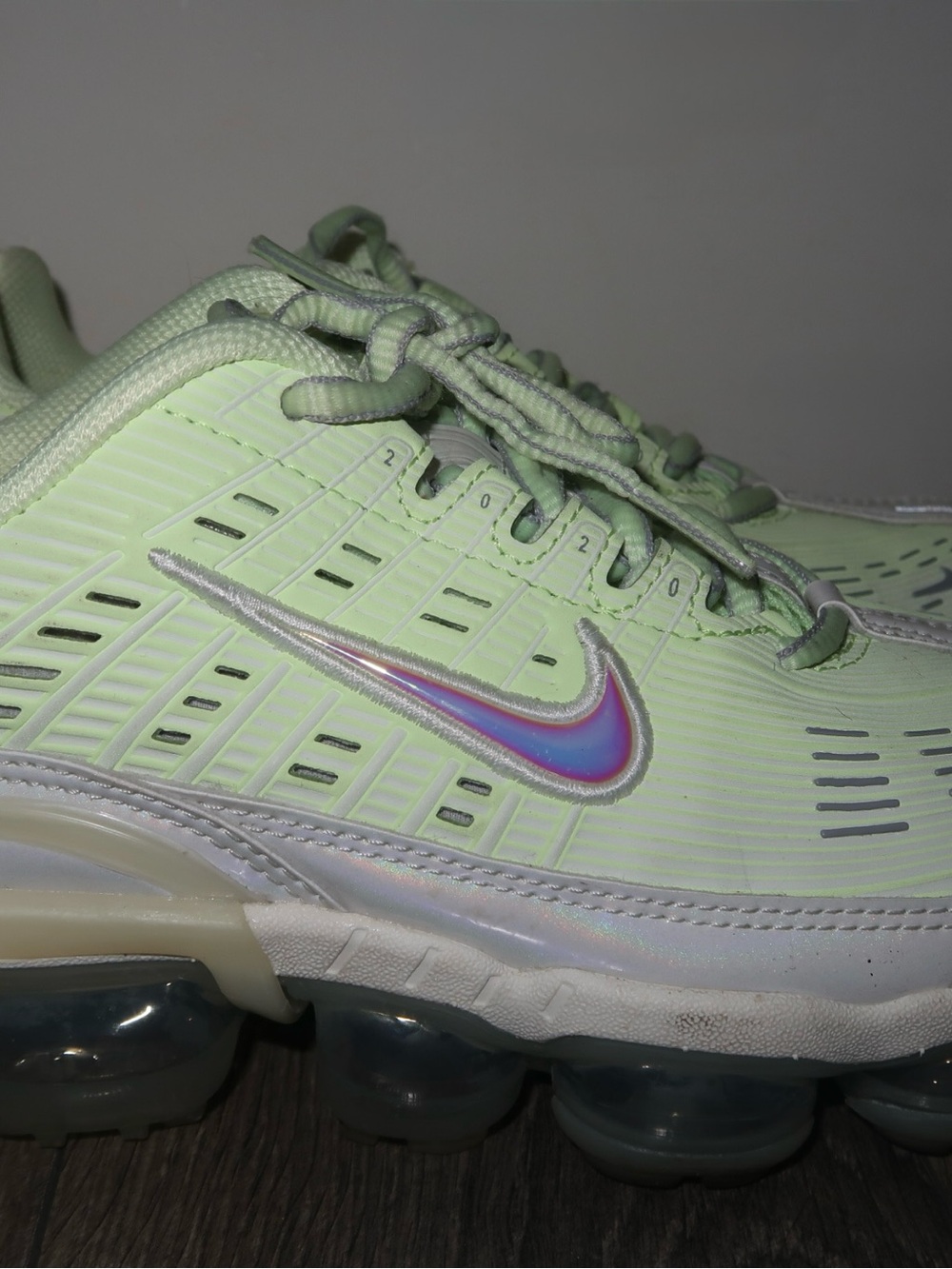 Nike Light Green Sneakers with Iridescent Swoosh